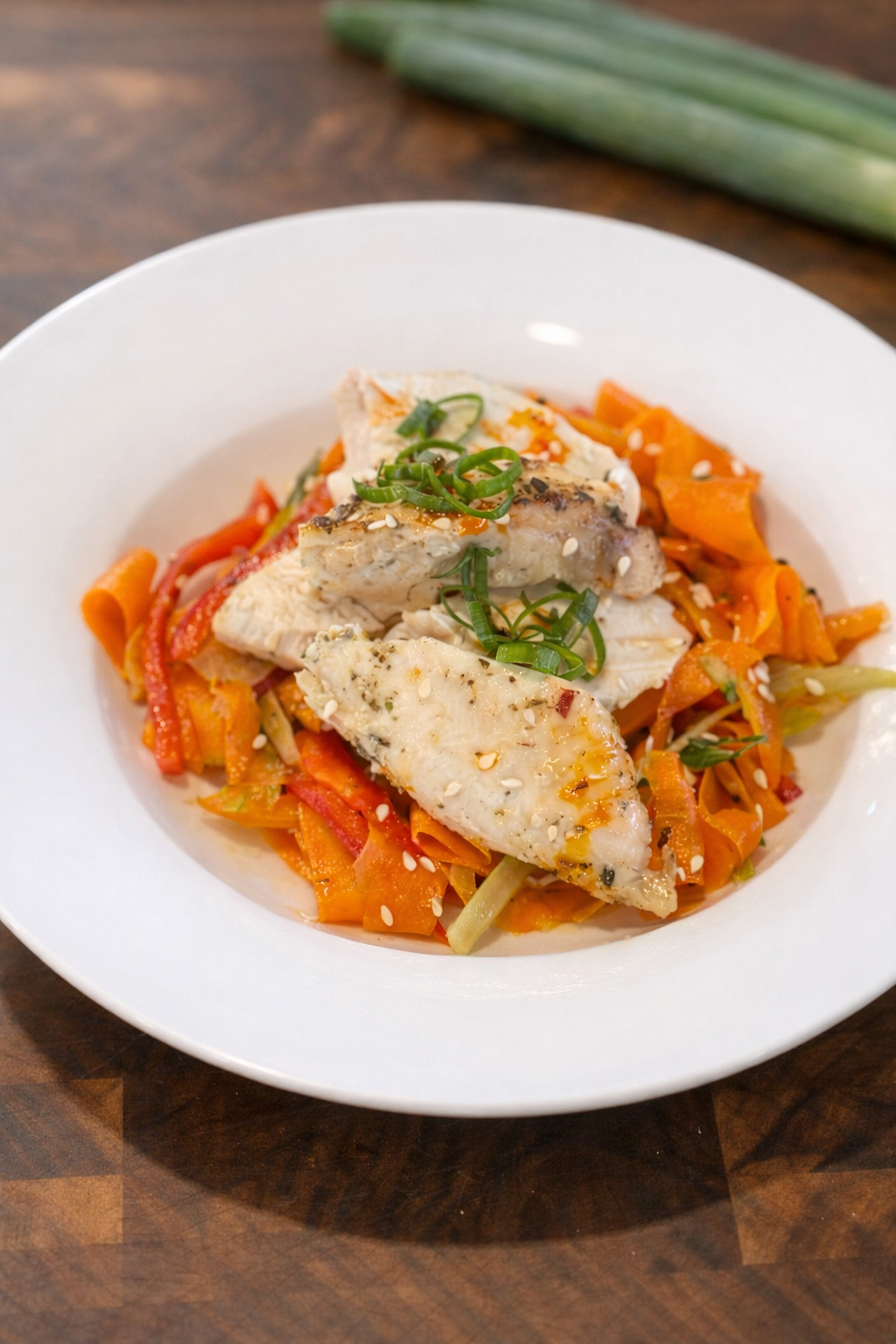 Roast chicken and carrot ribbon salad with a bold chili crisp dressing.