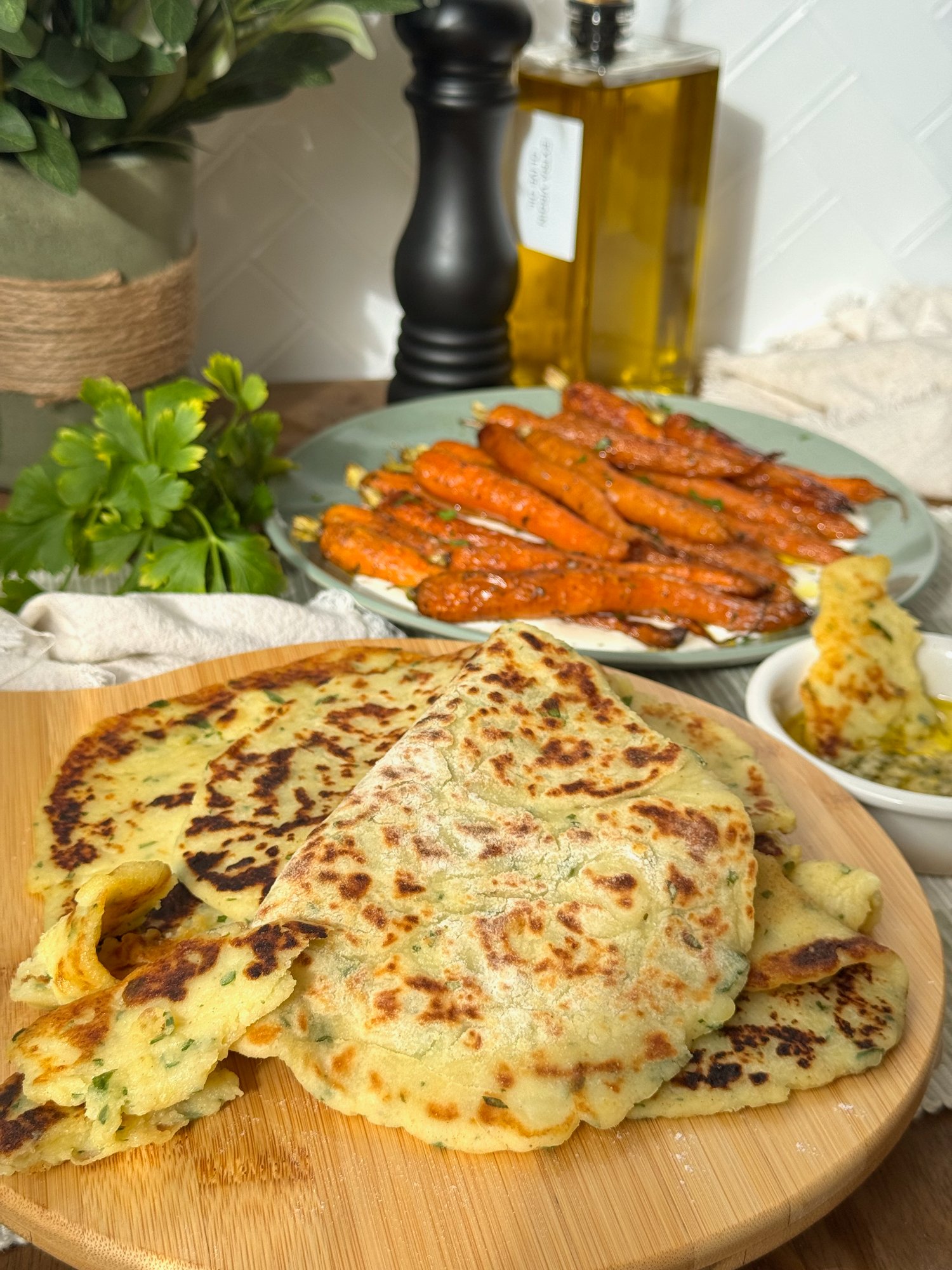 Soft potato, garlic and parsley flatbreads, golden from the pan.