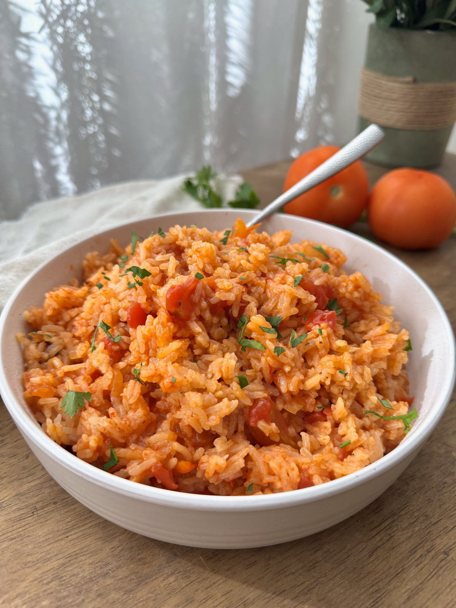 Traditional Portuguese tomato rice, soft and savory, in a bowl.