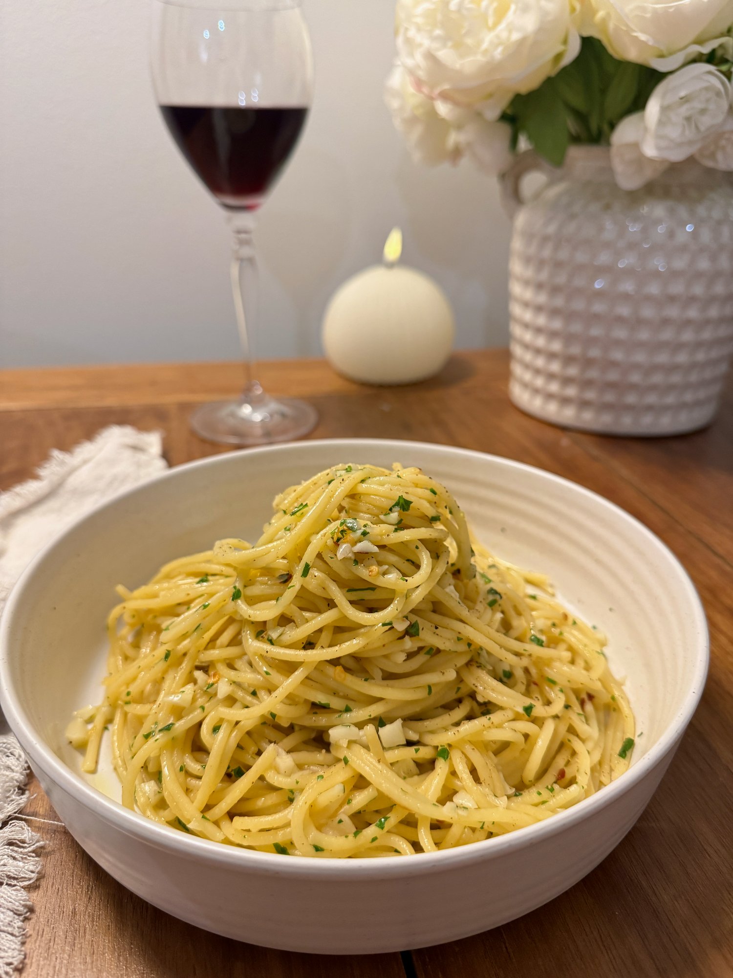 Spaghetti aglio e olio with garlic, chilli and chopped parsley.