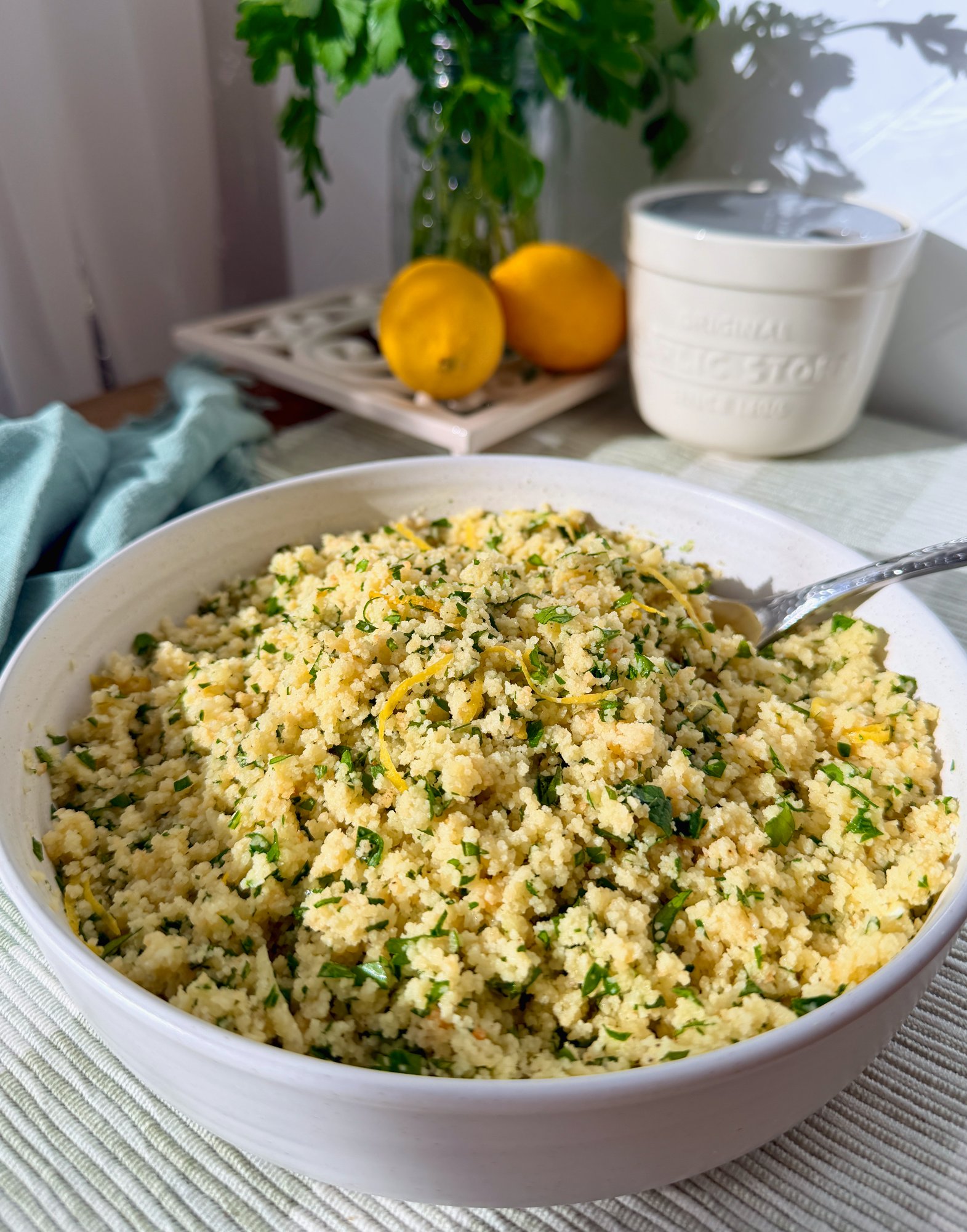 Fluffy couscous tossed with lemon zest and fresh herbs.
