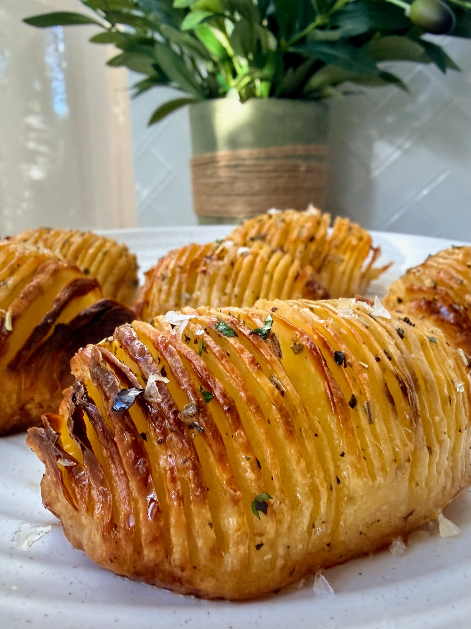 Crispy roast potatoes, or 'potato bugs,' with garlic butter and herbs.