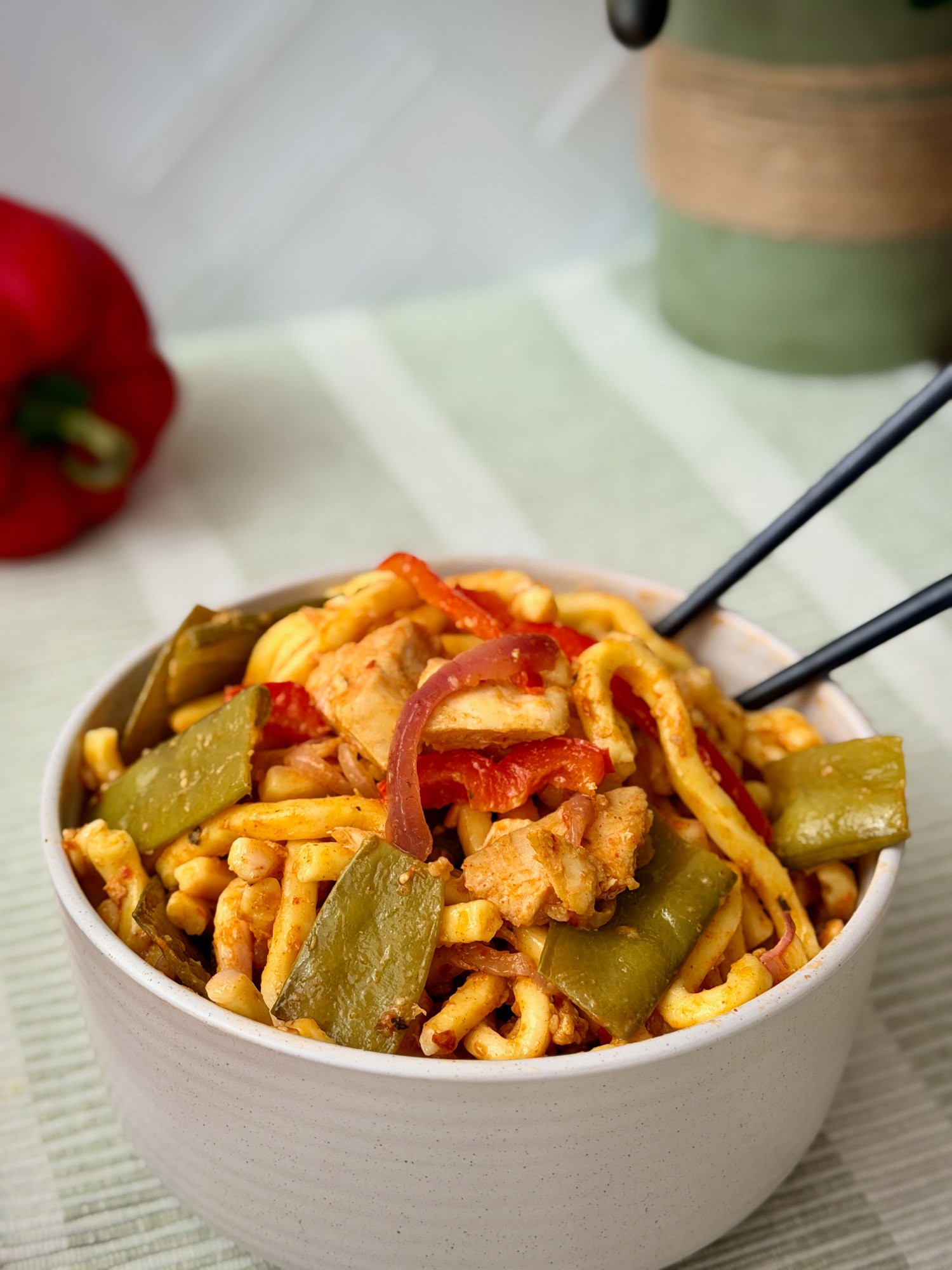 Peri peri chicken noodles with Hokkien noodles and crisp vegetables.