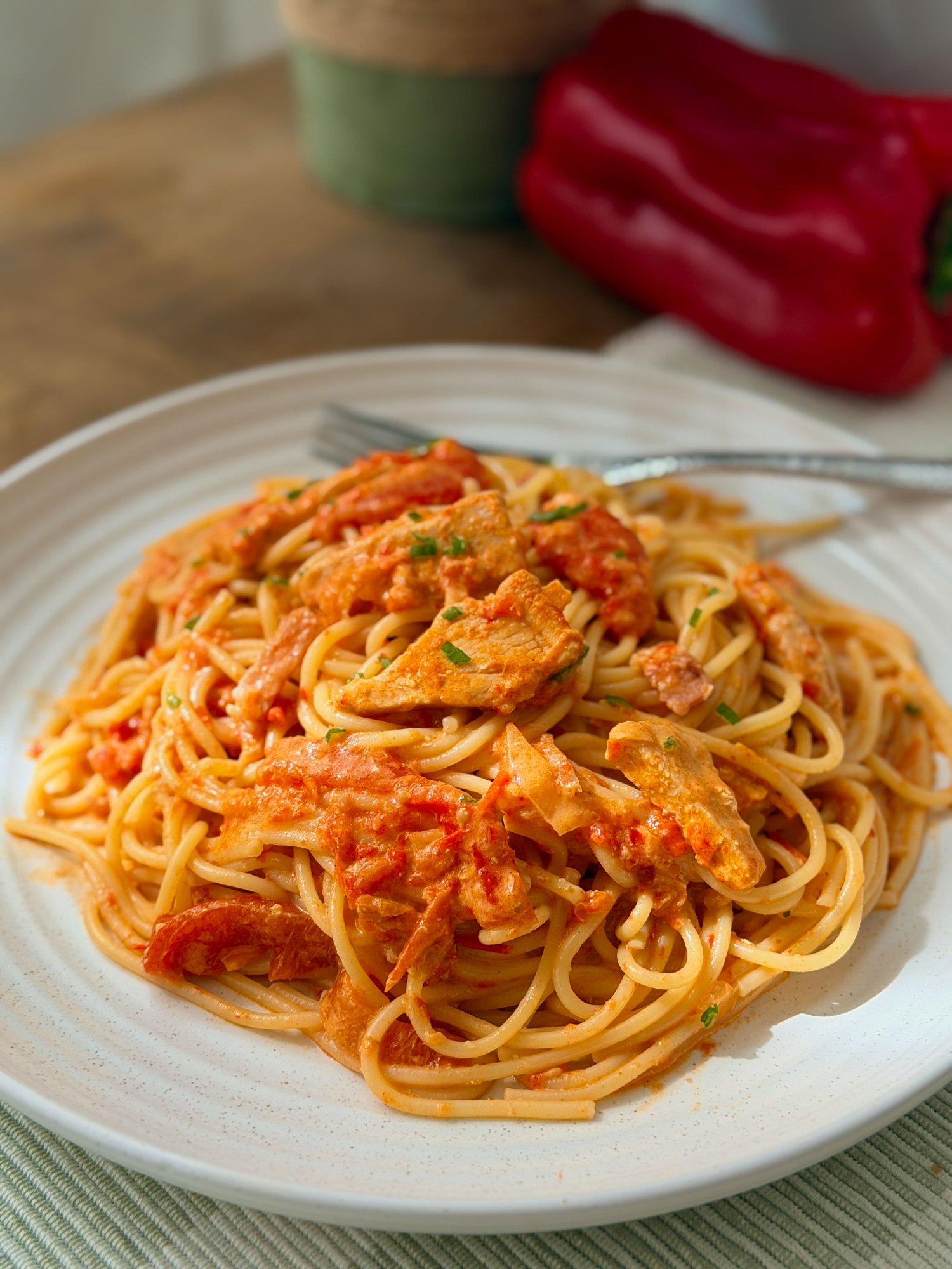 Spaghetti in a creamy roasted red capsicum sauce with smoky bacon and chicken.