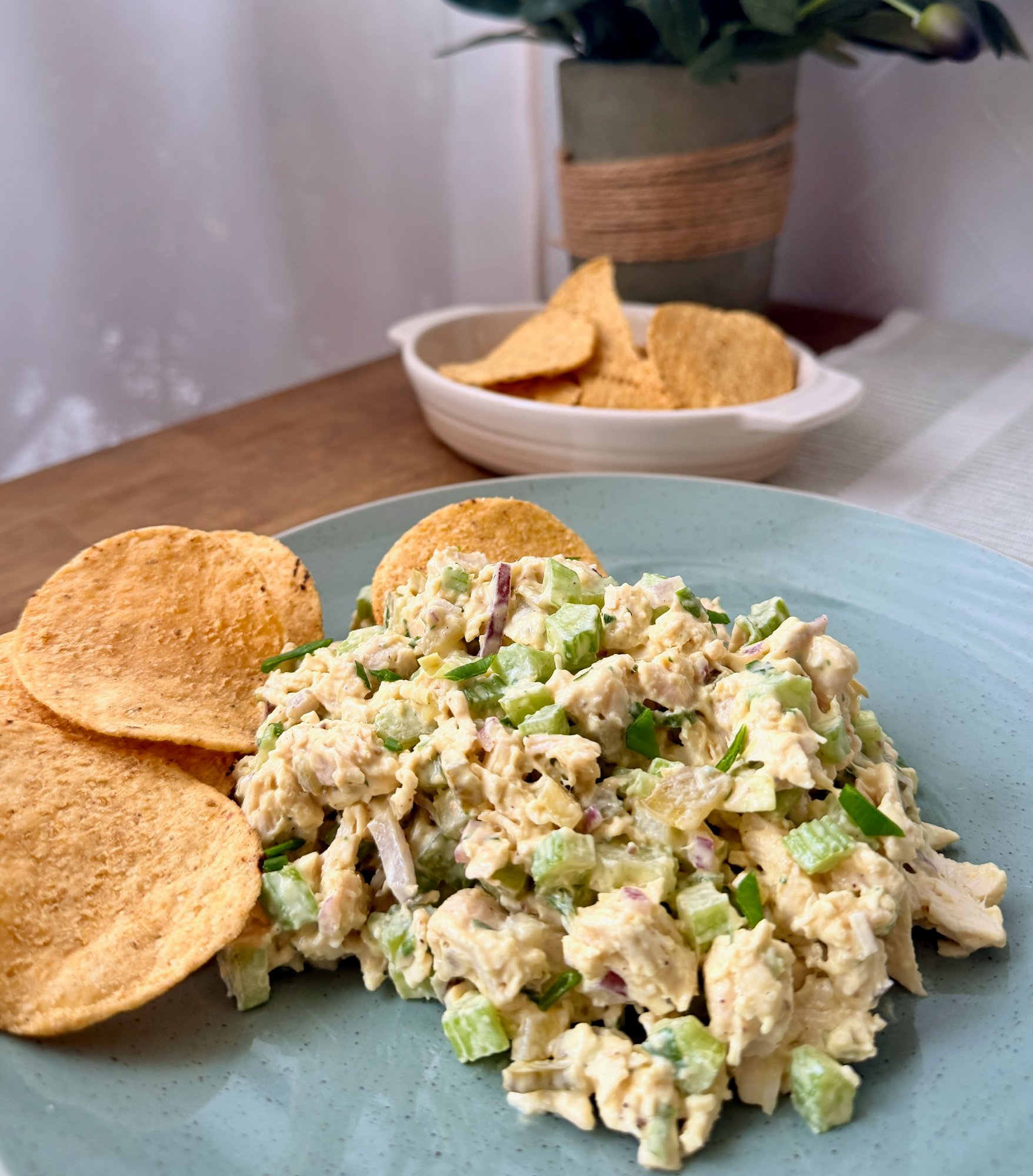 Crunchy chicken and celery salad in a creamy mustard dressing, served with corn chips.