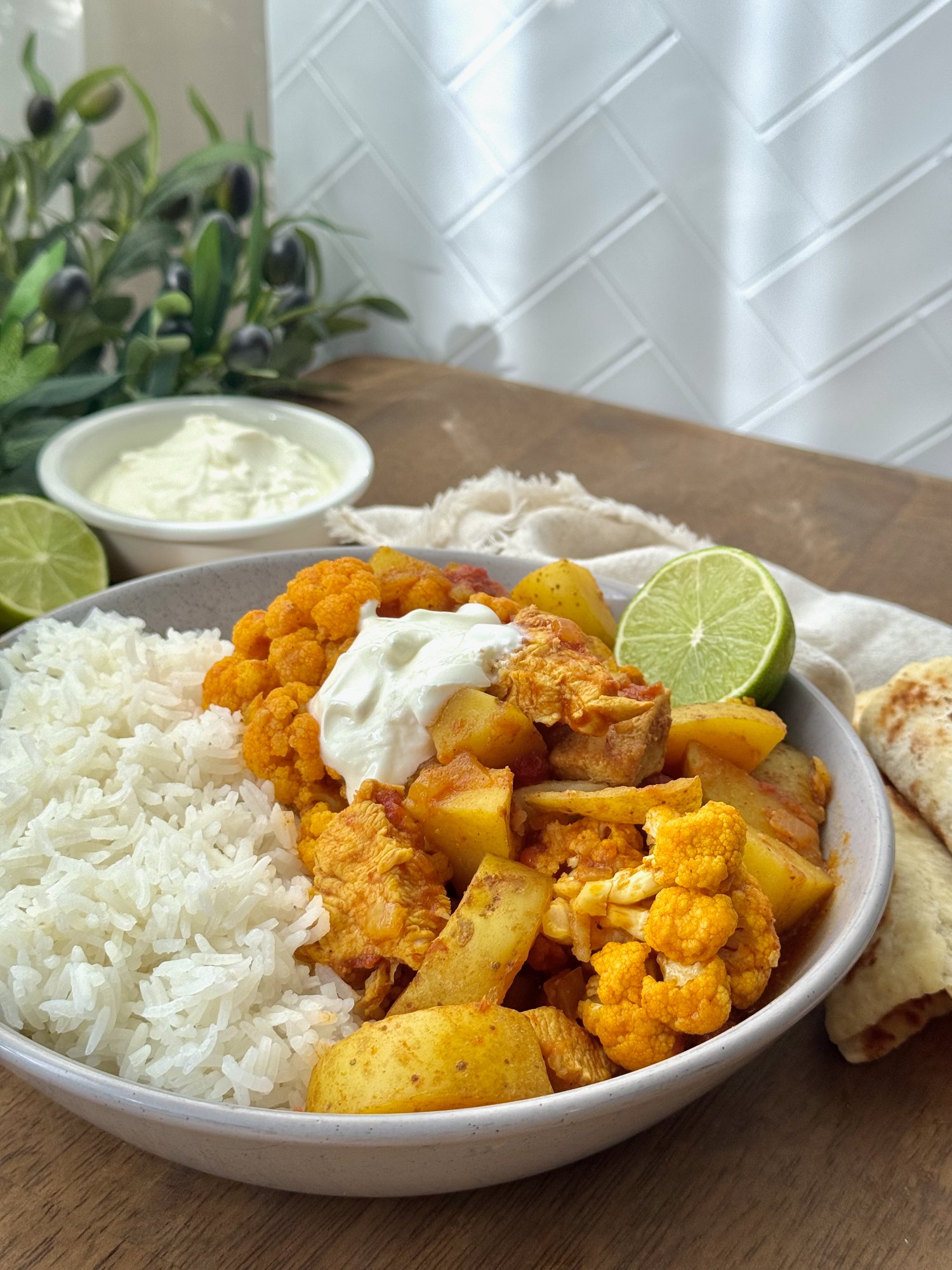 Chicken, cauliflower and potato curry in a rich tomato sauce, finished with Greek yoghurt.