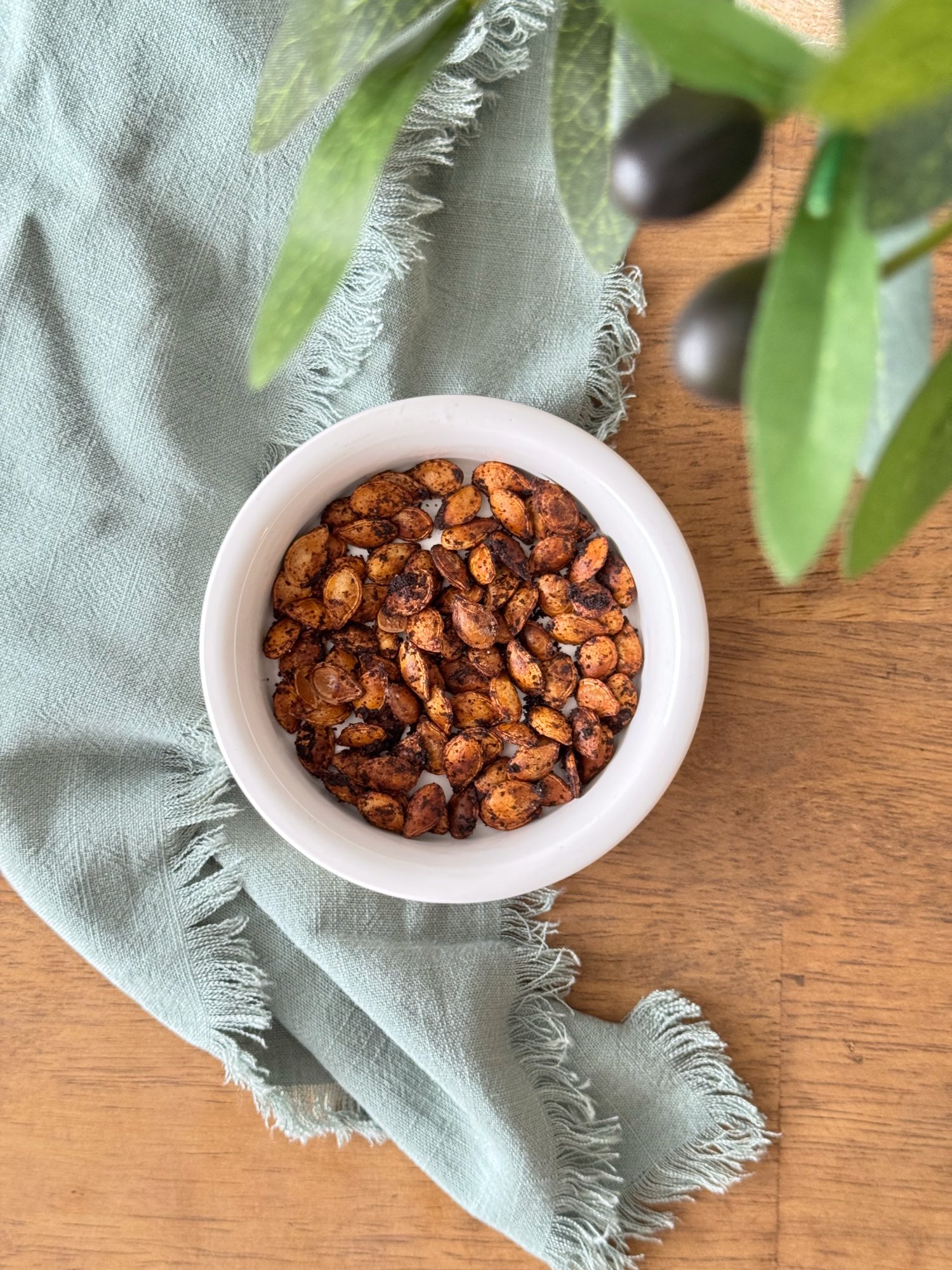 Crispy golden roasted pumpkin seeds coated in warm spices.