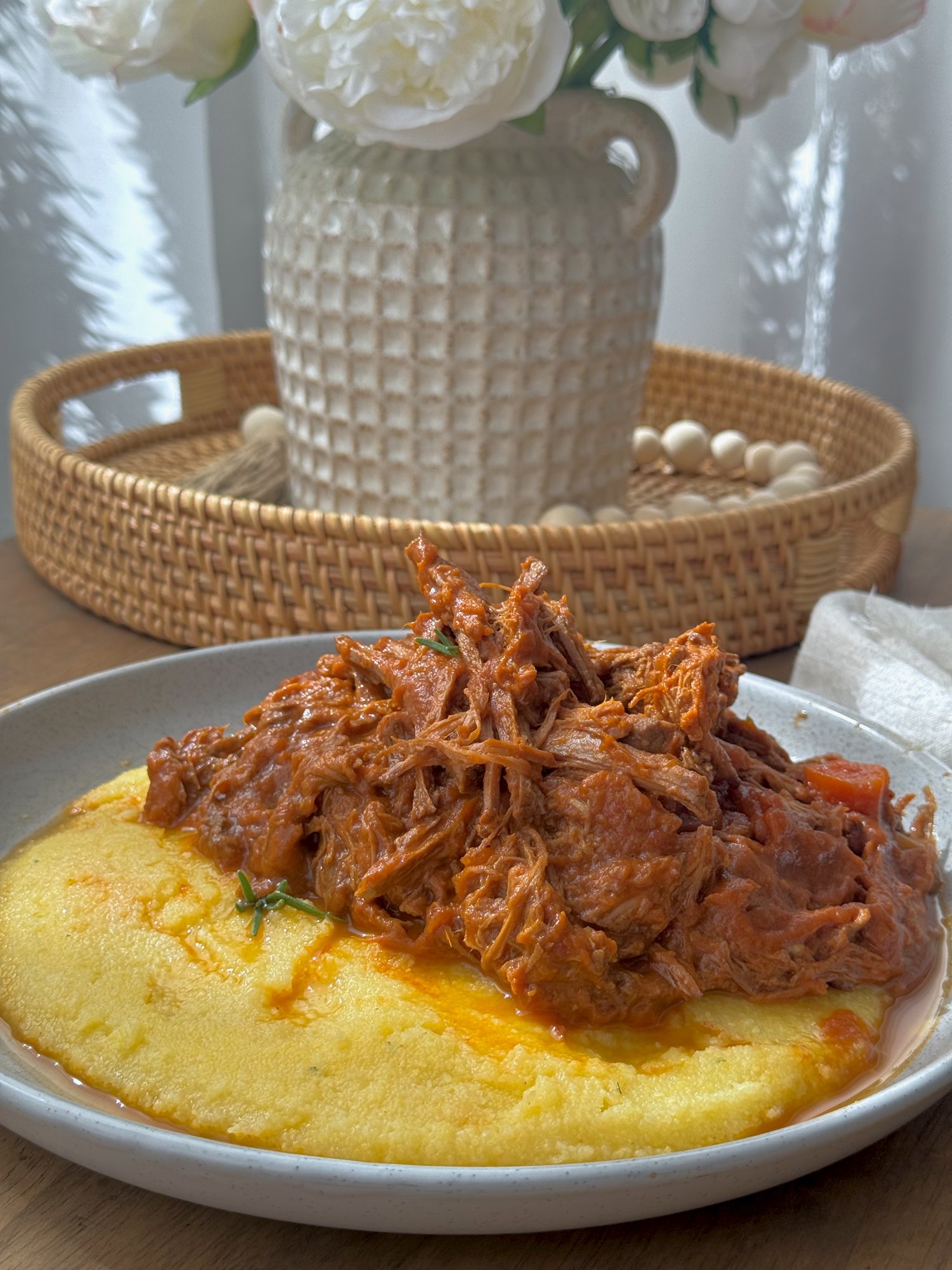 Slow cooked pulled beef in a rich red paprika and tomato sauce.